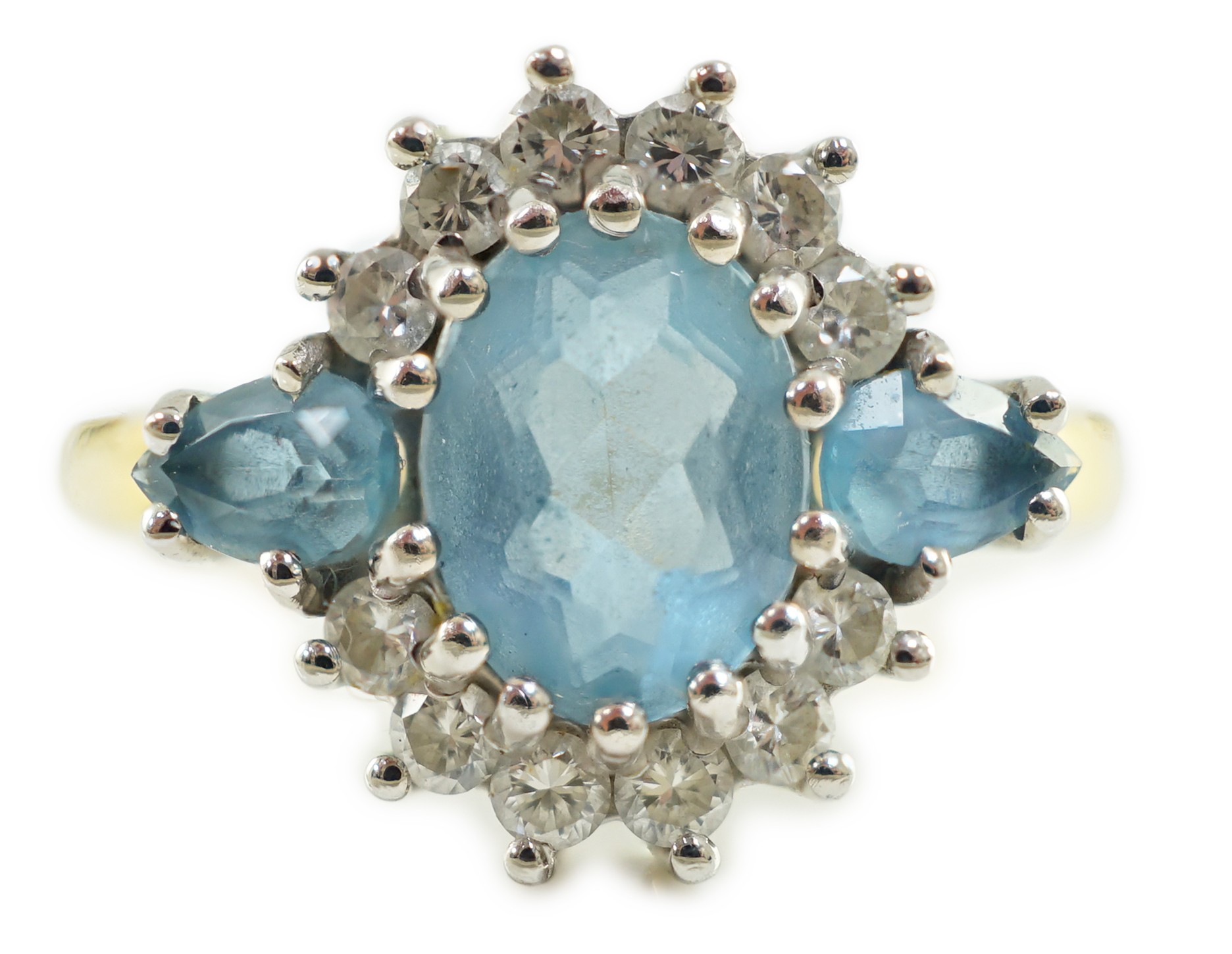 A 1970's 18ct gold, aquamarine and diamond set oval cluster ring, by Cropp & Farr